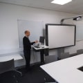 The Power of Interactive Whiteboards for Virtual University Tutoring