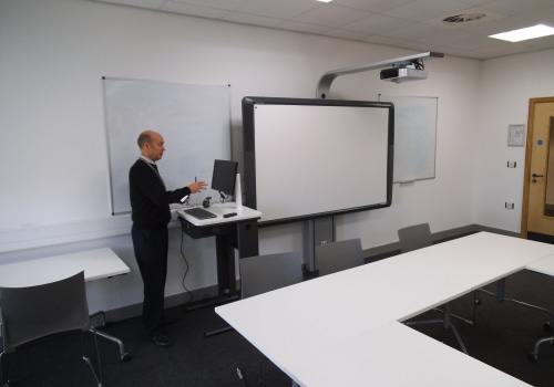 The Power of Interactive Whiteboards for Virtual University Tutoring